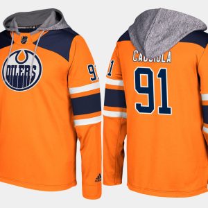 Exquisite Oilers #91 Drake Caggiula Orange Name And Number Hoodie